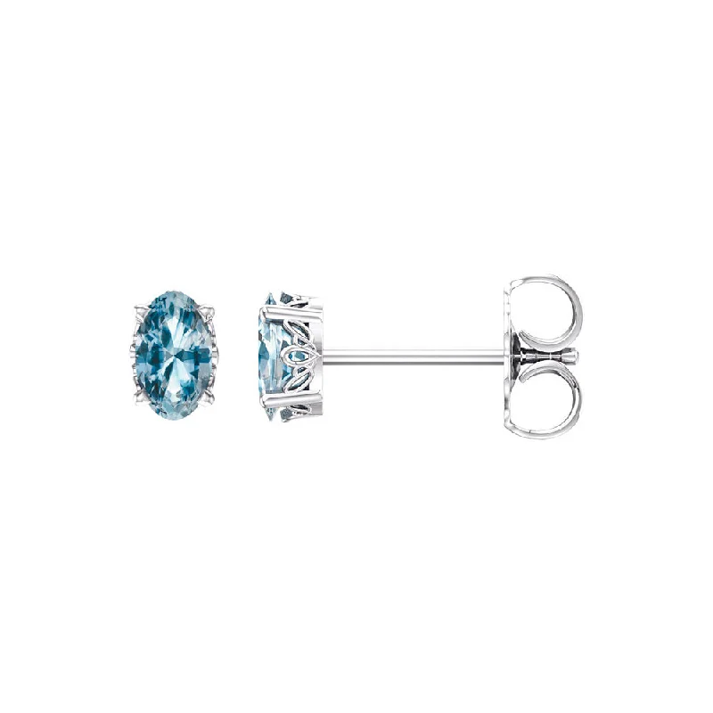 Luxury Diamond Earrings-Faceted Oval Sky Blue Topaz Stud Earrings in 14k White Gold